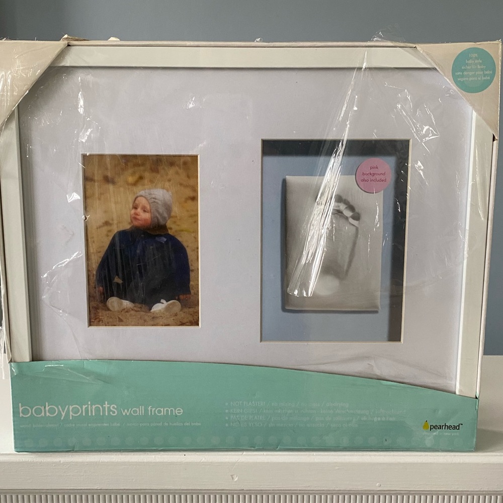 Frame baby pictures w/ foot/hand print